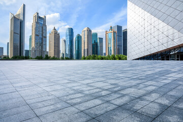 City square floor and modern office building in Shanghai - obrazy, fototapety, plakaty