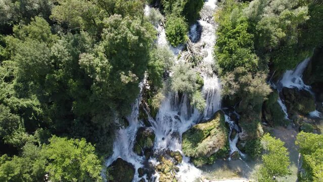 Kravica Waterfall top aerial view, Idyllic landmark. Static drone background