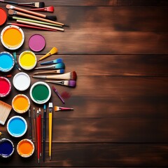 Artist's workshop. Art supplies, paint, brushes on wooden table. Banner background