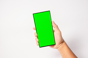 Mockup of man hand holding the black android smartphone with green screen white background