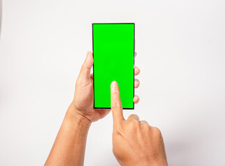 Mockup of man hand holding the black android smartphone with green screen white background