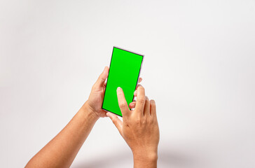 Mockup of man hand holding the black android smartphone with green screen white background