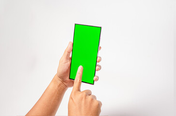 Mockup of man hand holding the black android smartphone with green screen white background