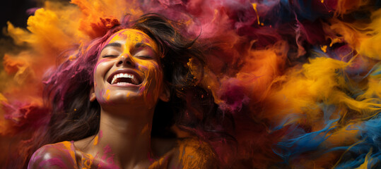 A woman's face is covered in colored powder, her expression joyful amidst a festival of colors.
