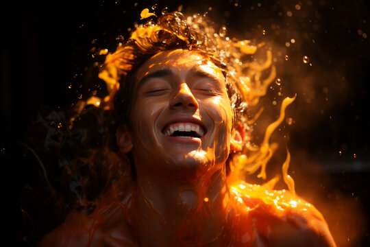 A person's face is wet, with a fiery backdrop creating a dramatic scene.
