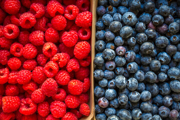 Blueberries and raspberries background