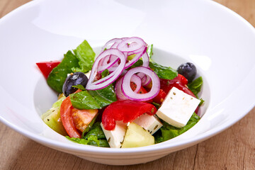 greek salad on the white plate