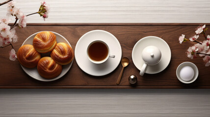 Coffee and Buns on Wooden Table