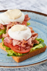 toast with poached egg and bacon