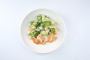 Caesar salad on the white background