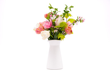 Elegant mixed pastel colored spring bouquet in white vase on white background. Spring flowers. Tulips bouquet.