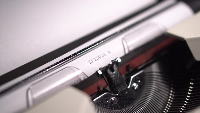 Episode 6, Typing on White Paper in Vintage Typewriter, Close Up