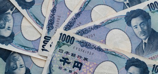 Fototapeta na wymiar Background of pile Japanese Yen