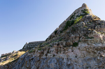 Fototapeta na wymiar Ancient fortress on top of a cliff in Greece