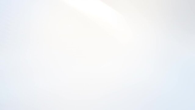Abstract clean white grey blurred wave for elegant business corporate presentation background. Luxury particle light glitter smooth motion digital technology video.	