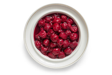 Cherry jam. Canned cherries in a plate on a white background. Top view.