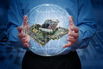 A man holds a stylised, highlighted earth with some industrial embedded CPU boards inside. Concept...