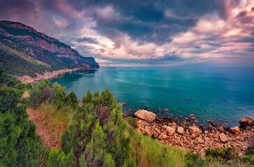 Dramatic sunset on Crimea, Sudak resort location, Ukraine, Europe. Calm morning seascape of Black...