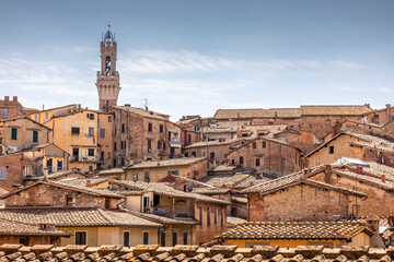 Siena, Italy - July 26, 2023: The cityscape of Siena, in the hearth of Tuscany