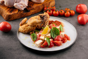 Cooked gherkin chicken with vegetable salad