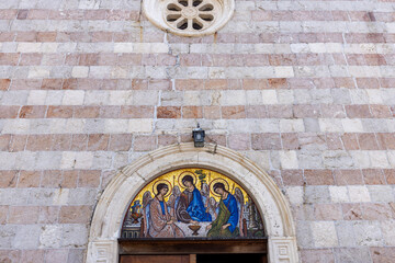 Religious themed mosaic above the entrance to the Holy Trinity Orthodox Church, Budva, Montenegro