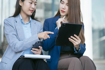 Business team meeting present.professional investor working with new startup project. Finance managers task.Digital tablet laptop computer design smart phone in morning light.