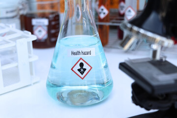 Health hazard Symbols of chemicals in test tubes, chemicals in the laboratory
