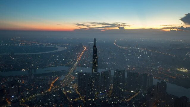 Aerial Hyper lapse Ho Chi MInh City, Vietnam night to day at the beautiful sunrise