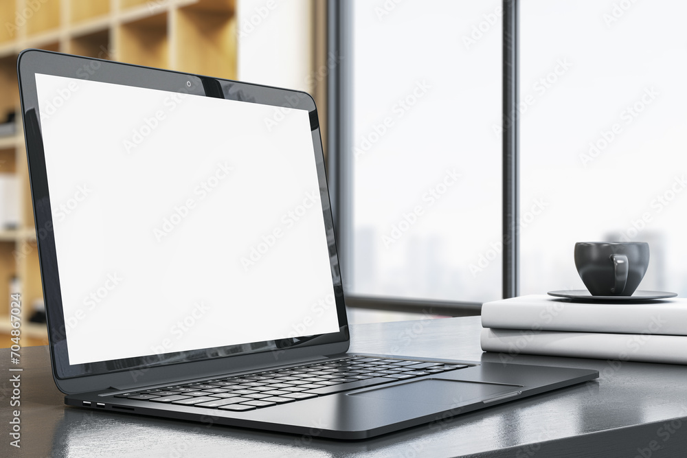 Poster side view of contemporary designer office desktop with empty white mock up laptop screen, coffee cup