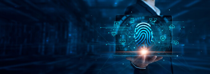 Cyber security and business data protection. Businessman using fingerprint scan online access...