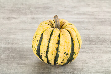 Ripe raw fresh decorative pumpkin