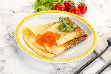 Russian pancake with red caviar