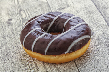 Glazed sweet tasty chocolate donut