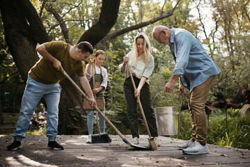 Volunteers helping at community cleanup at the local park