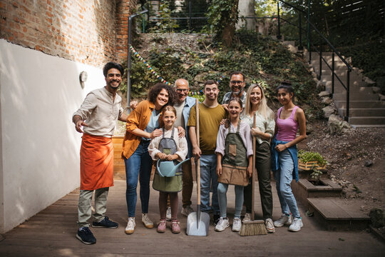 People working in community garden at socially inclusive neighbourhood project