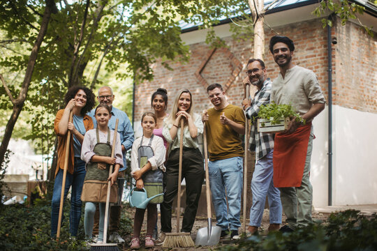 People working in community garden at socially inclusive neighbourhood project