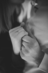 Marriage proposal. Will you marry me. She said yes. A couple hand with wedding ring. Love concept. Elegant template for design for Valentine's Day. Engagement ring. Black and white photo. - obrazy, fototapety, plakaty