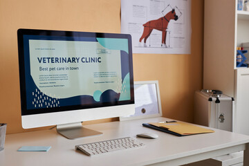 Desktop computer with web page in veterinary clinic