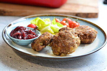 a traditional Czech dish of fried meatballs, minced meat with vegetables,