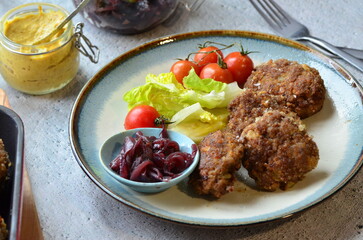 a traditional Czech dish of fried meatballs, minced meat with vegetables,