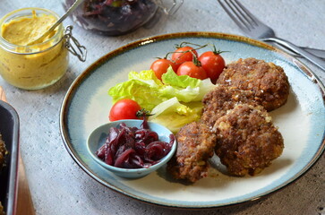 a traditional Czech dish of fried meatballs, minced meat with vegetables,