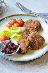 a traditional Czech dish of fried meatballs, minced meat with vegetables,