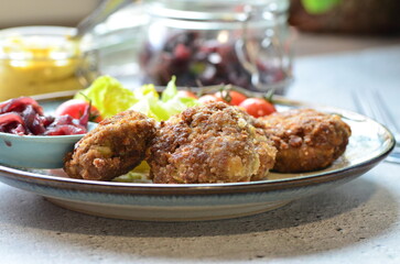 a traditional Czech dish of fried meatballs, minced meat with vegetables,