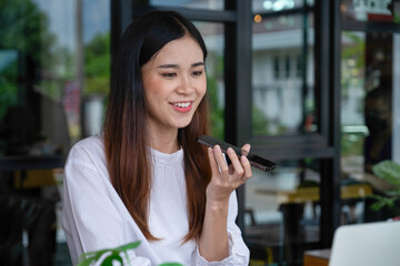 Businesswomen drive online store success together.