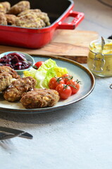 a traditional Czech dish of fried meatballs, minced meat with vegetables,