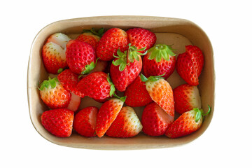 Fresh strawberry in a box on white background