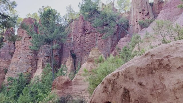 Exciting rock structure with different columns and earth layers in Provence in France in nature in wonderful weather