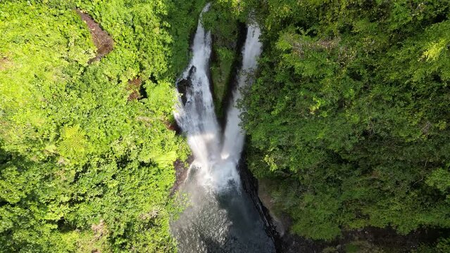 Aerial shot of Aling Aling waterfall in Bali island, Indonesia