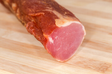 Сross section of dry-cured pork tenderloin in selective focus
