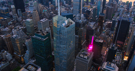 Aerial View of Times Square in New York City in Midtown Manhattan. Helicopter Flying Above the...